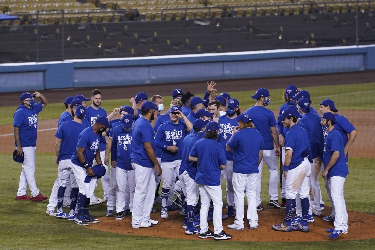 The Dodgers celebrate after clinching the National League West title 