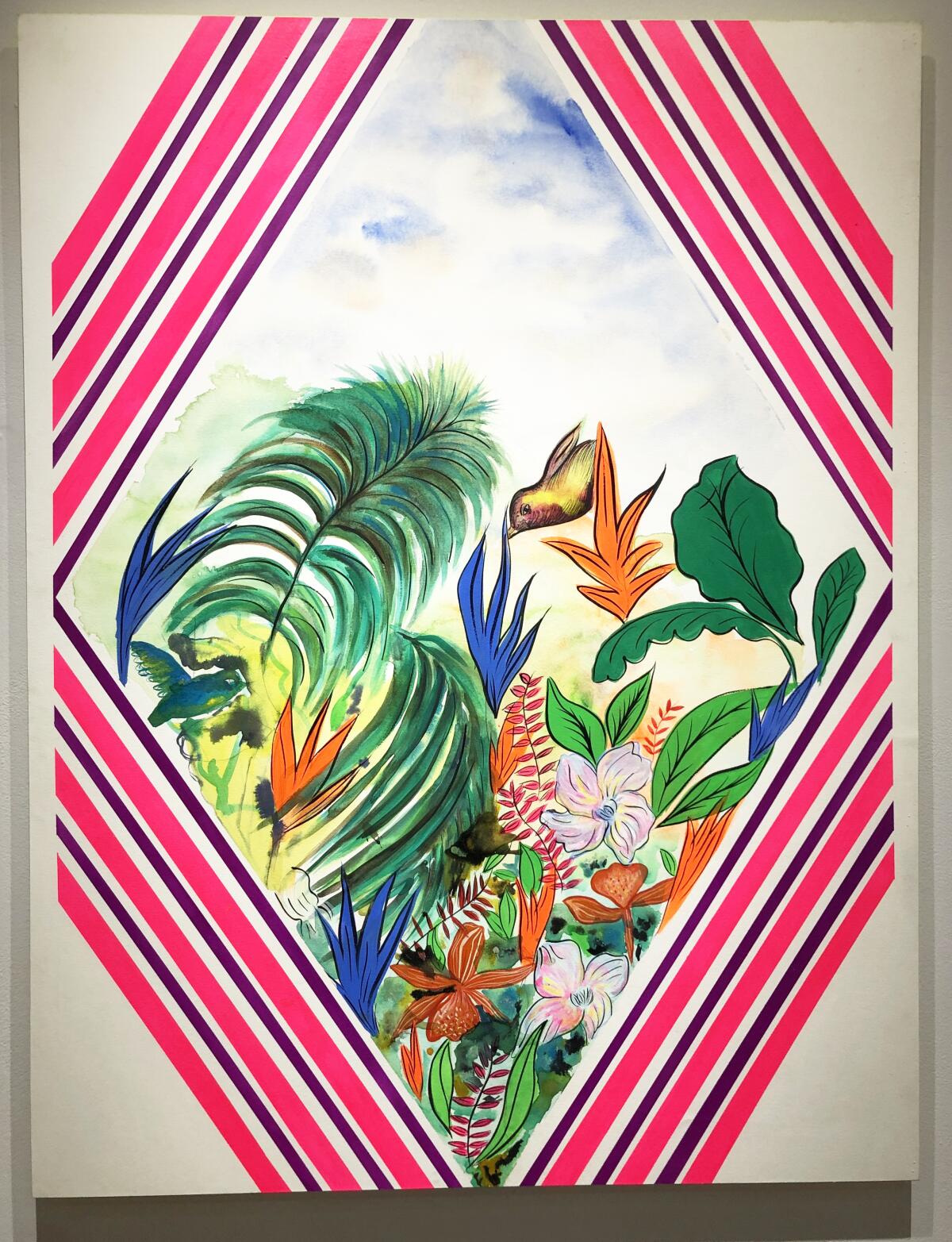 A painting by Carolyn Casta?o features a tropical scene surrounded by bright bands of color