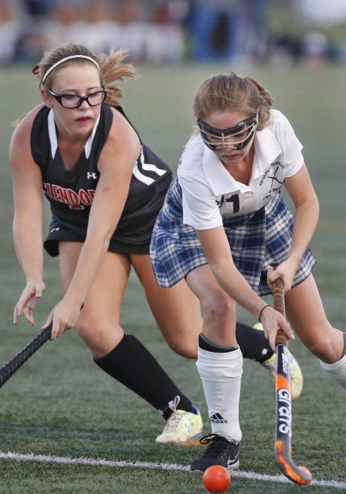 Newport Harbor's Mckenzie Porteous, right, controls the ball ahead of Glendora's Paige Lehin.