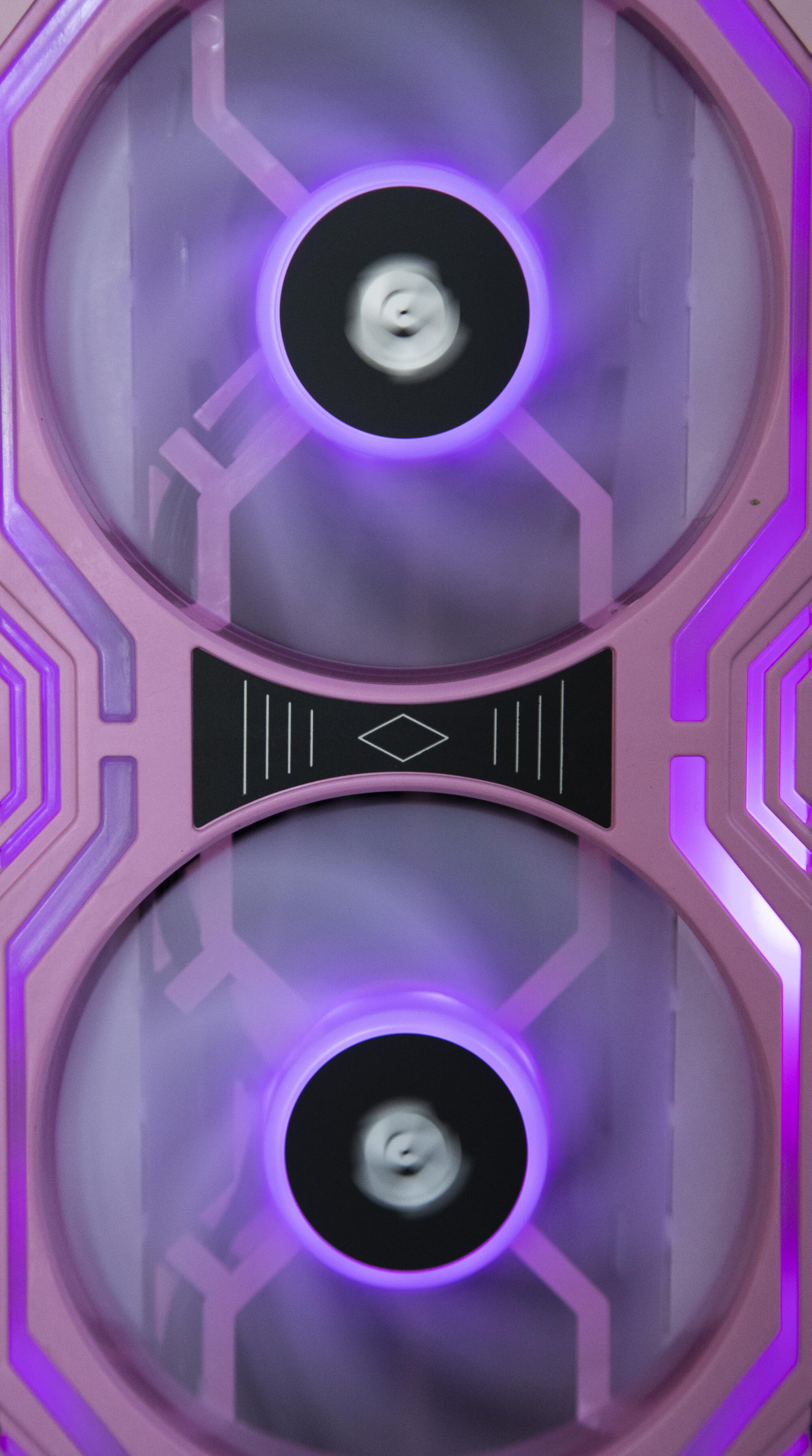An air filter system made with computer fans and purple lights.