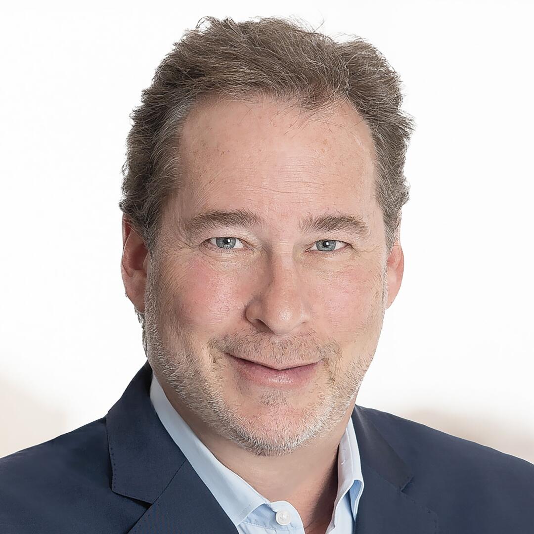 A portrait of Andrew Kramer