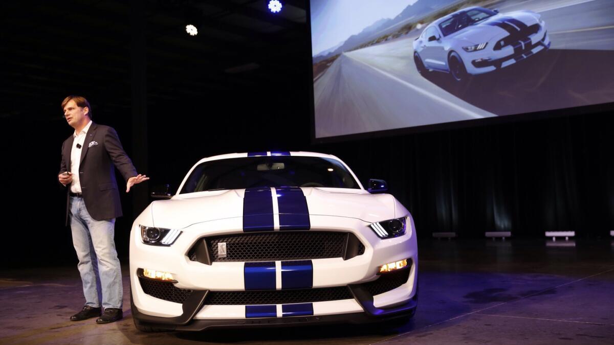 Jim Farley shows off the new Shelby GT350 Mustang in 2015.