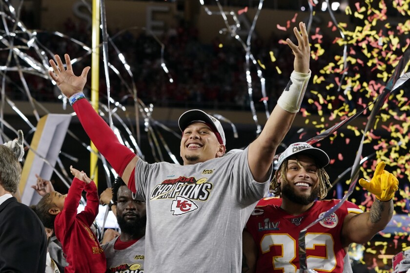 Kansas City Chiefs quarterback Patrick Mahomes, left, and teammate Tyrann Mathieu celebrate after defeating the San Francisco 49ers in Super Bowl LIV at Hard Rock Stadium on Sunday.