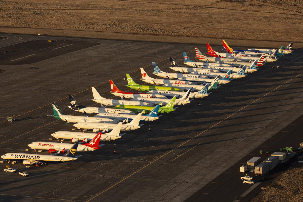 Boeing 737 Max planes sit parked