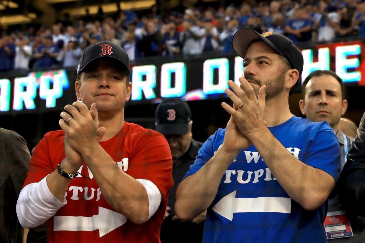 Matt Damon and Jimmy Kimmel at the final game of the 2018 World Series.