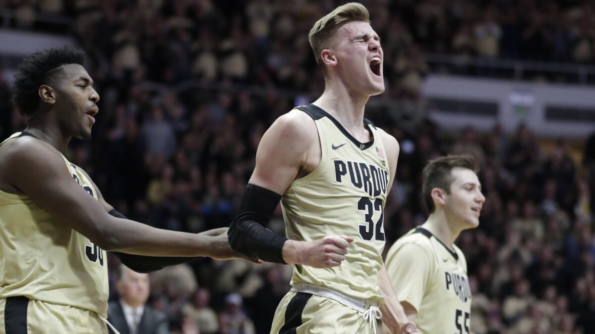 Purdue center Matt Haarms (32) celebrates during the Boilermakers' upset of Michigan State on Sunday.