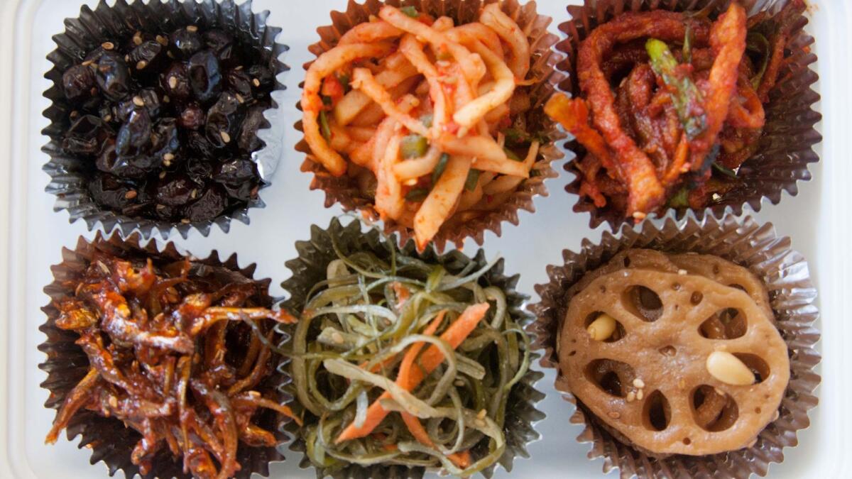 Shown is the Foodshop’s sampler box, with the banchan arranged in cupcake liners.