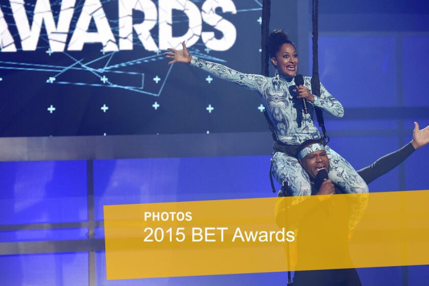 Hosts Tracee Ellis Ross and Anthony Anderson perform at the opening of the BET Awards at the Microsoft Theater on June 28.