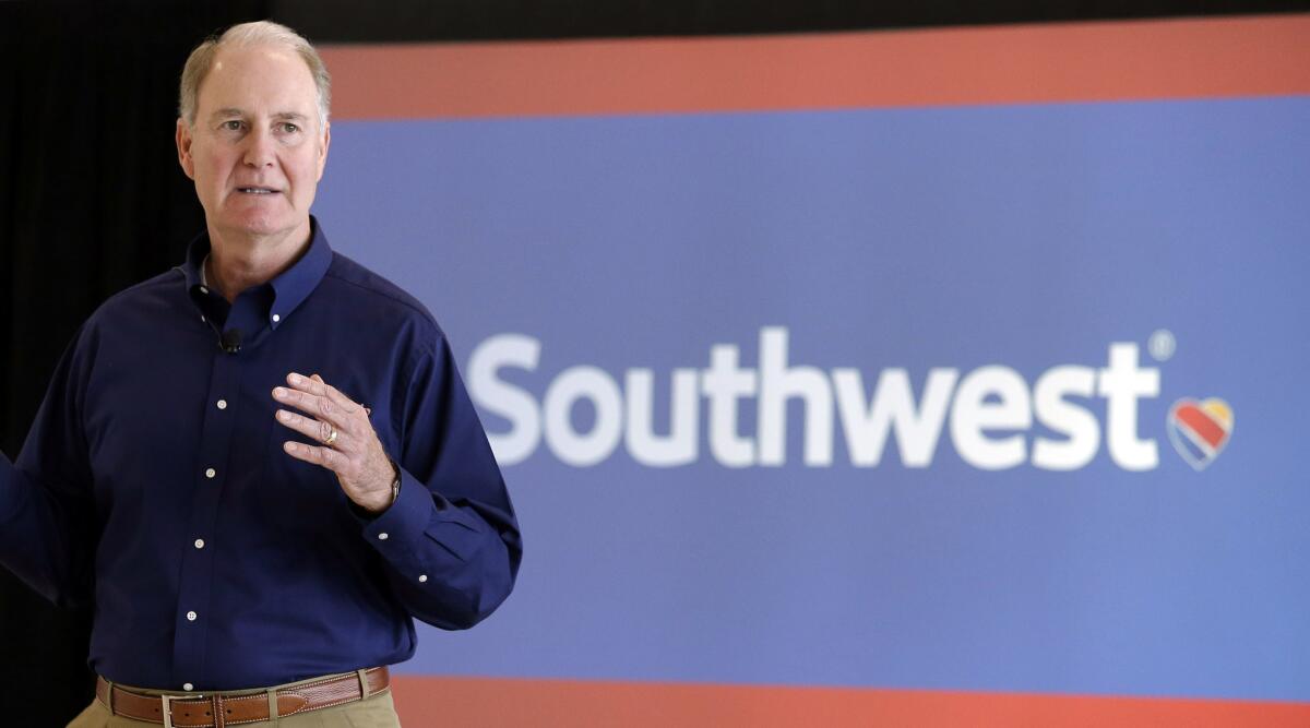 Southwest Airlines CEO Gary Kelly speaks at Houston Hobby Airport. Southwest announced it would pay $1,000 bonuses to employees because of the recently enacted tax cuts.