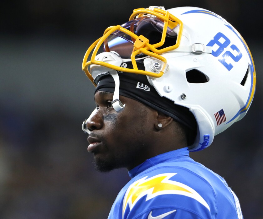 Chargers kick returner DeAndre Carter stands on the sidelines during a preseason game.