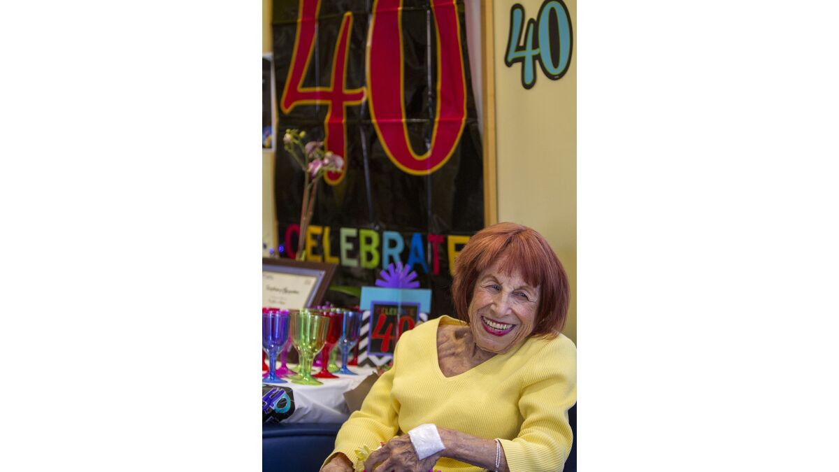 Celia Kanter, 77, smiles during a party Friday at Newport Beach Dialysis in honor of her 40 years on the kidney treatment.