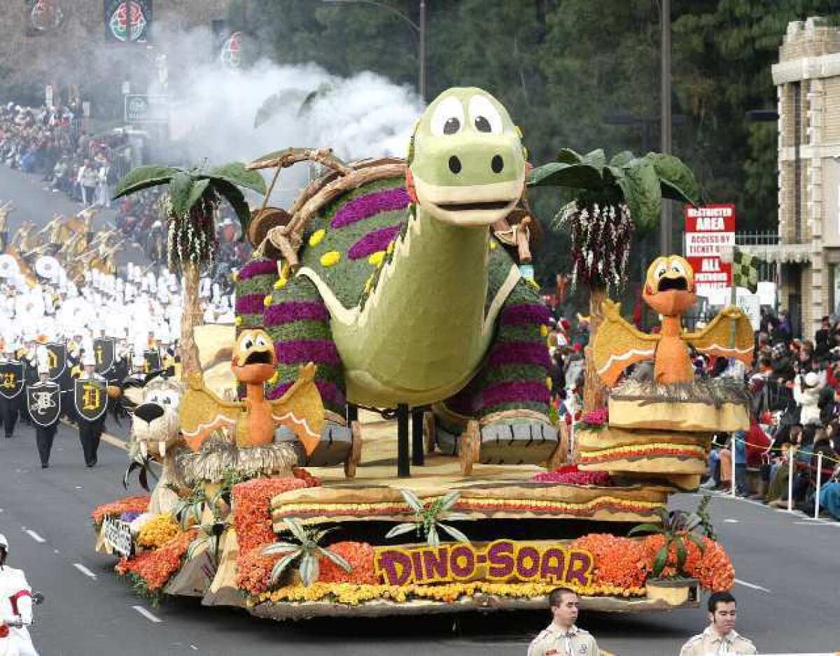 "Dino-Soar," the float made by the La Canada Flintridge Tournament of Roses Assn., rolls down Colorado Boulevard during the 124th Rose Parade on Jan. 1, 2013.