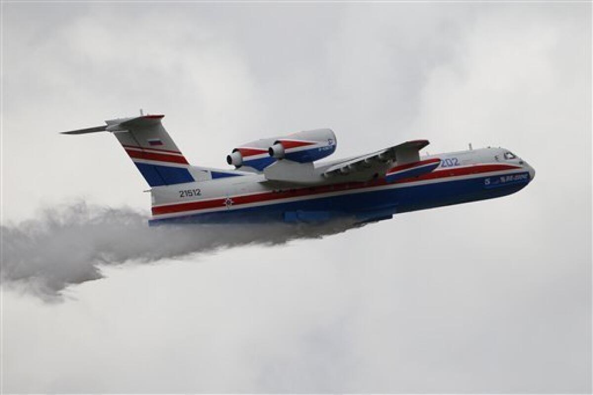 Russian Amphibious Beriev BE-200ES Drops Water in Dubai Airshow