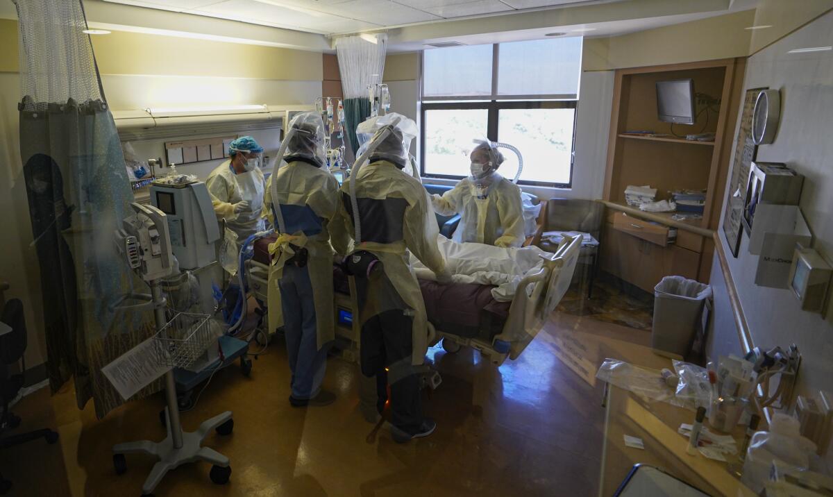 A COVID-19 patient is treated in Chula Vista, Calif., in June.