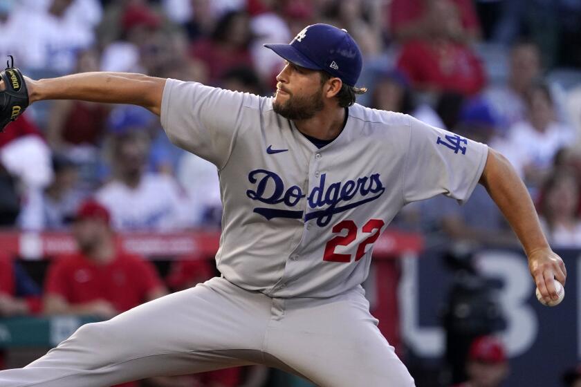 Los Angeles Dodgers starting pitcher Clayton Kershaw throws to the plate during the second inning.