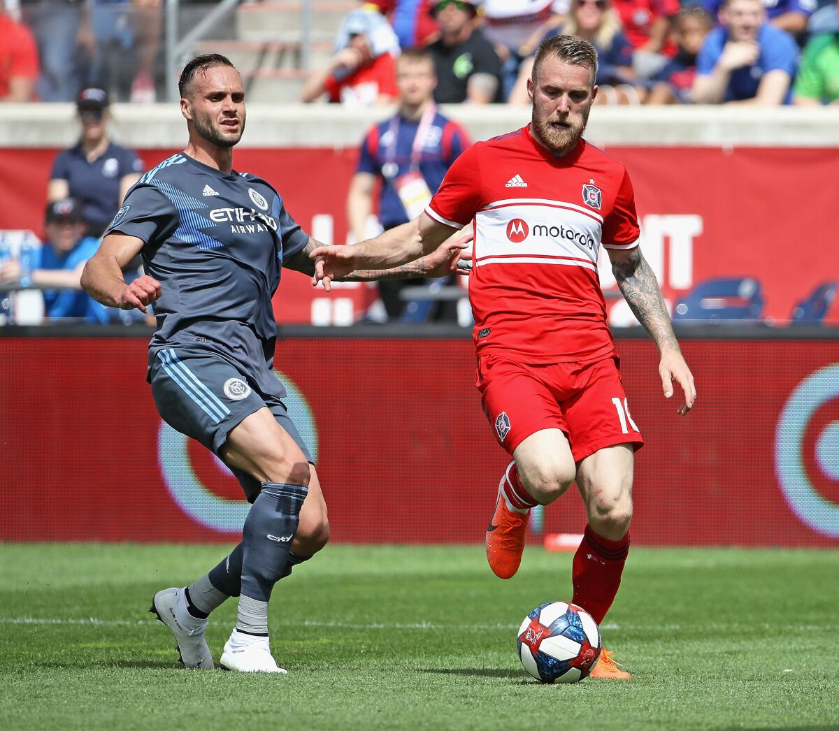 Aleksandar Katai of the Chicago Fire advances the ball against Maxime Chanot of New York City FC during a match on May 25.
