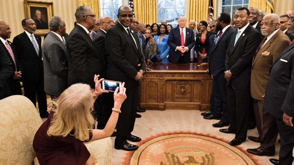 President Trump meets with leaders of historically black colleges in the Oval Office on Feb. 27. It went viral as the "Kellyanne Conway on the couch" meme.