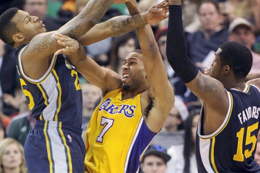 Lakers guard Xavier Henry is expected to be out another week because of a sprained knee, the team announced Tuesday.