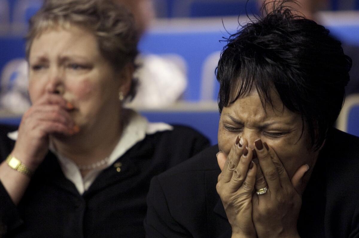 Celeste Peterson, right, the mother of Virginia Tech shooting victim Erin Peterson, cries after an earlier court ruling on the college's liability.