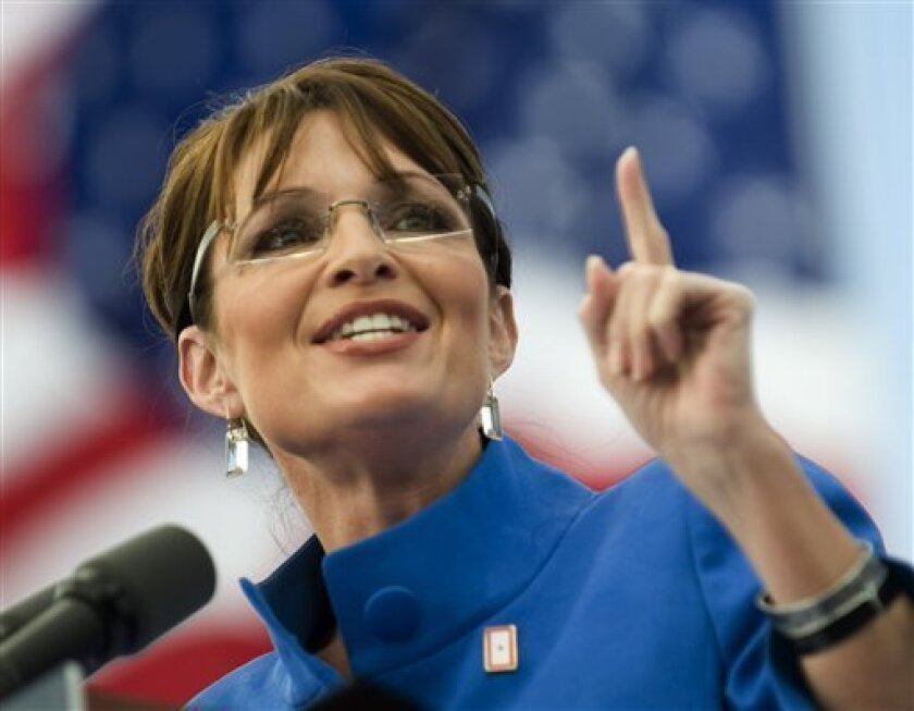 Republican vice presidential candidate, Alaska Gov. Sarah Palin, attends a rally at the West Port High School in Ocala, Fla., Saturday, Nov.1, 2008. (AP Photo/Phil Sandlin)