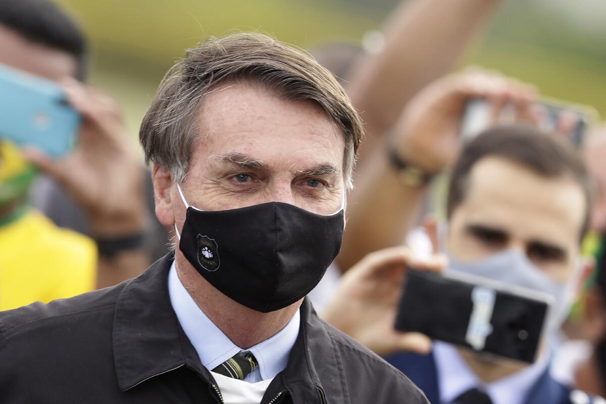 Brazilian President Jair Bolsonaro outside his official residence Monday in Brasilia.