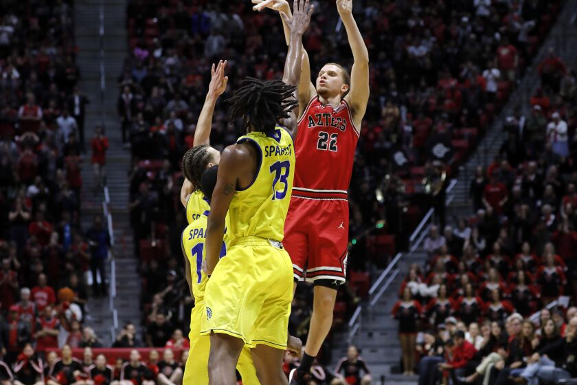 San Diego State's Malachi Flynn makes the game-winning three pointer with one second left against San Jose State in San Diego on Dec. 8, 2019.