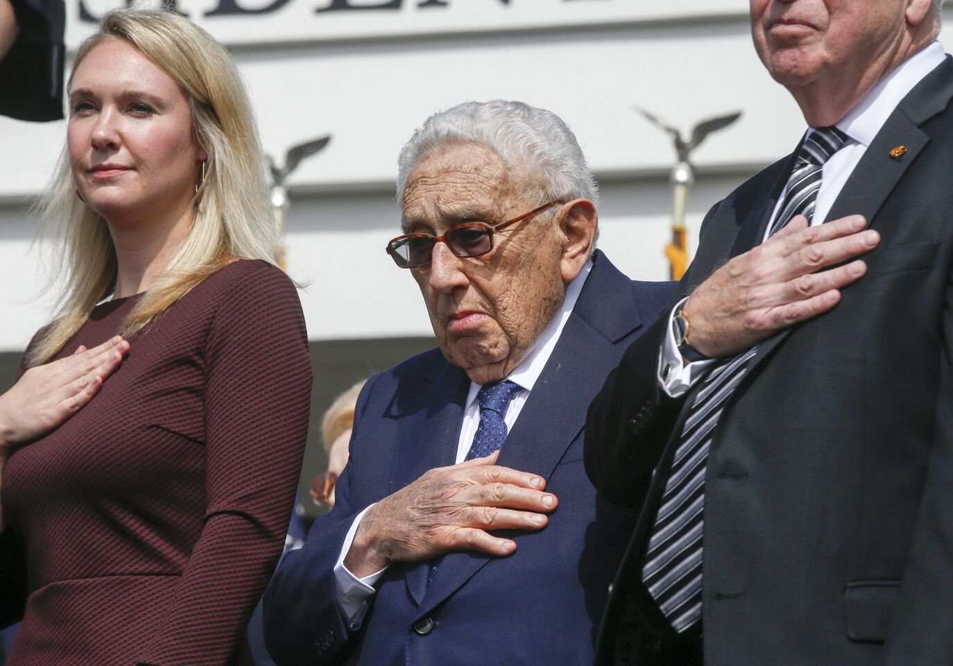 Richard Nixon's graddaughter Melanie Eisenhower and former Secretary of State Henry Kissinger join family, friends and former staff of the late president during opening ceremonies for the newly renovated Nixon Presidential Library and Museum in Yorba Linda.
