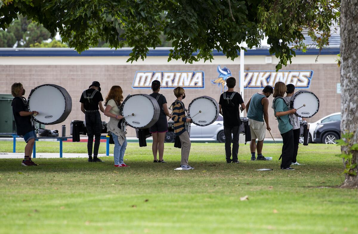 Members of the band at Marina High School practice on Wednesday, the first day of school for the 2021-22 year.