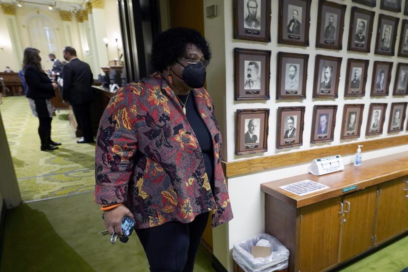 Democratic Assemblywoman Shirley Weber leaves the Assembly Chambers at the Capitol Sacramento, Calif., Thursday, Jan. 28, 2021. California lawmakers approved Weber, the first black person to become the Secretary of State, filling the position vacated by Alex Padilla who Gov. Gavin Newsom appointed to the U.S. Senate to replace Kamala Harris. (AP Photo/Rich Pedroncelli)