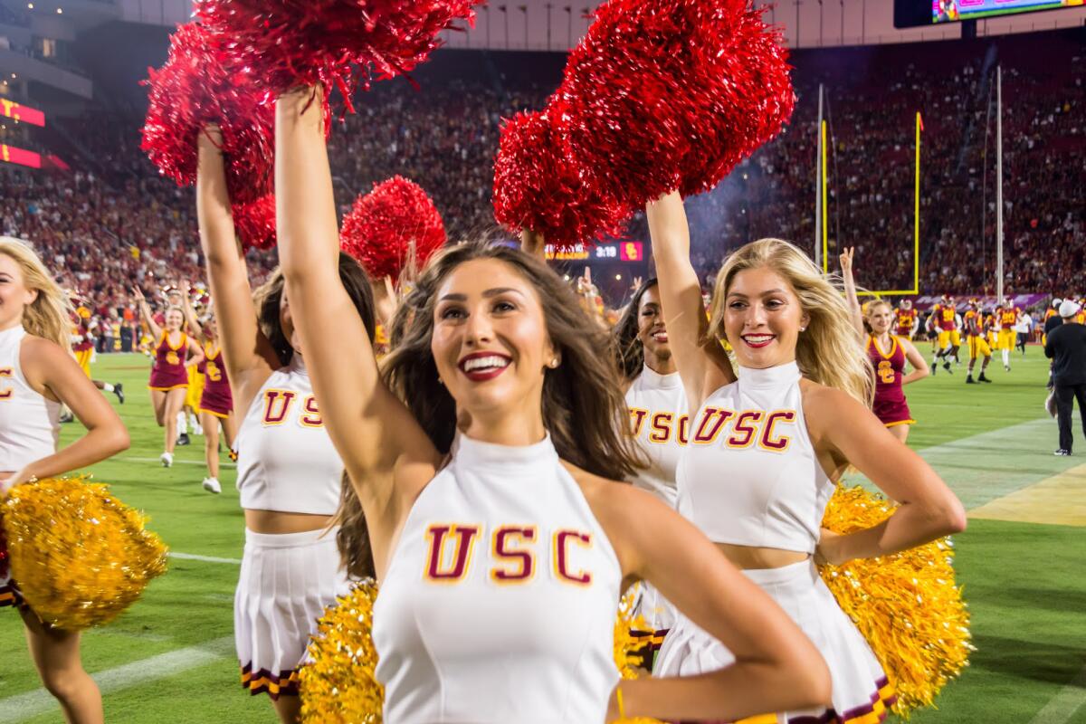USC Song Girl Adrianna Robakowski cheers during a Trojans football game.