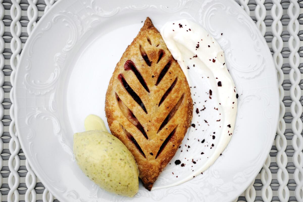 Strawberry sumac and sweet cheese pastry with pistachio ice cream, labneh cream and cured sumac from Bavel.