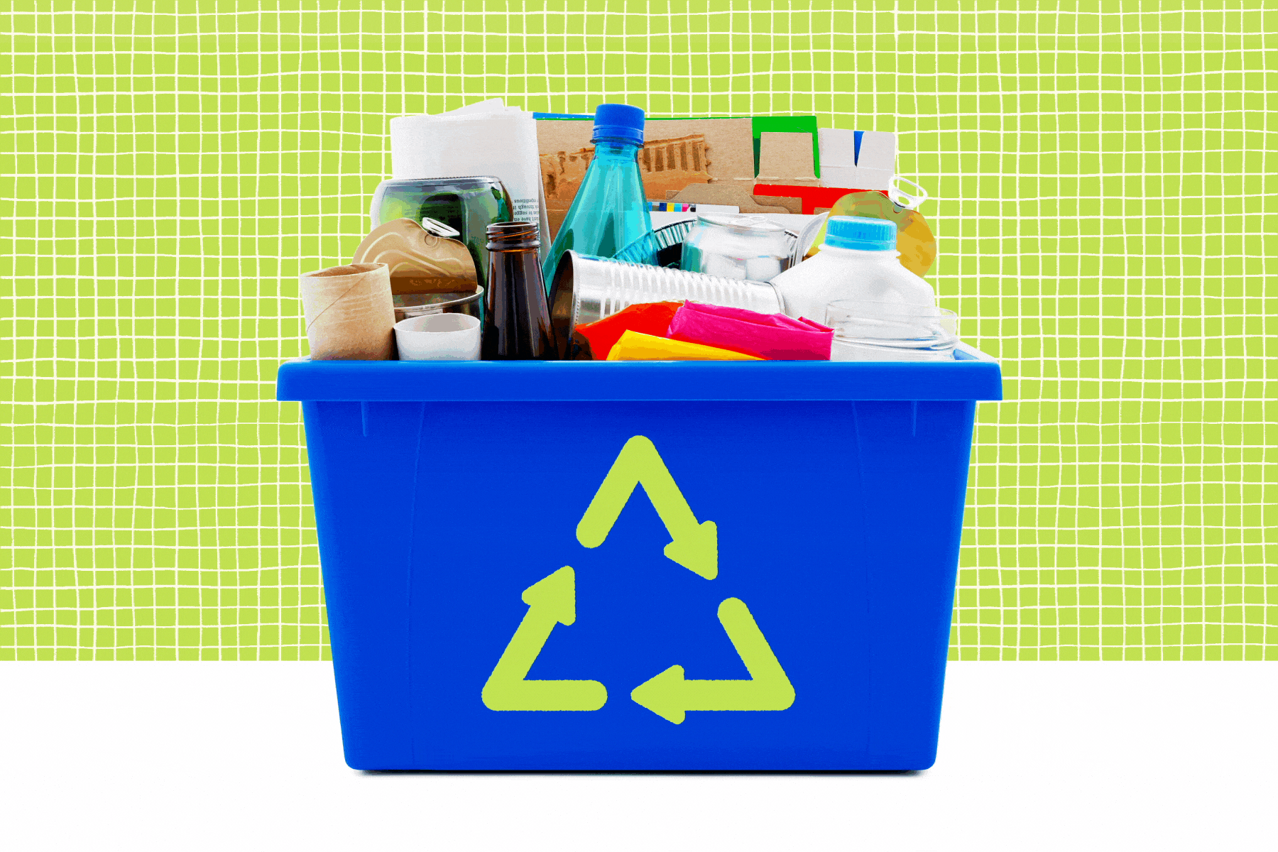 A blue recycling basket filled with items.