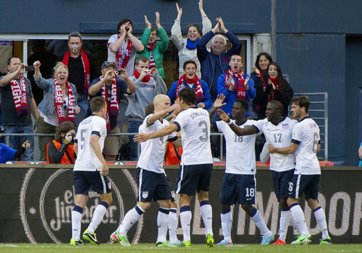 The U.S. soccer team and their fans celebrate after Jozy Altidore (17) scored against Panama during the first half.