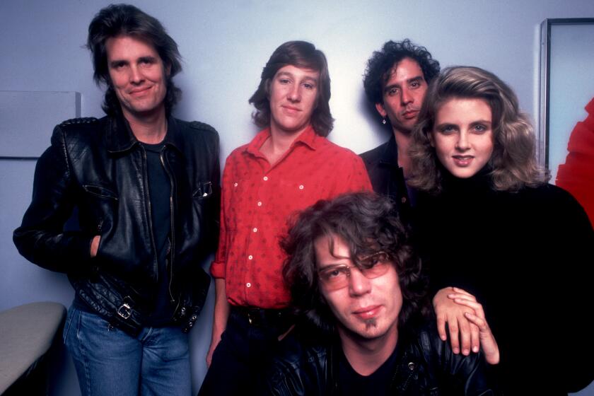 Portrait of Lone Justice at the Park West in Chicago, Illinois, October 7, 1985. Left to right, Tony Gilkyson, Ryan Hedgecock, Don Heffington(in glasses), Marvin Etzioni, and Maria McKee. (Photo by Paul Natkin/Getty Images)