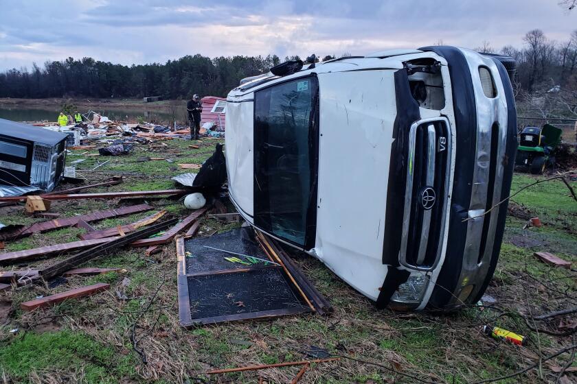 This photo provided by Bossier Parish Sheriff's Office shows damage from Friday nights severe weather, including the home of an elderly in Bossier Parish, La., on Saturday, Jan. 11, 2020. The Bossier Parish Sheriff's Office said that the bodies of an elderly couple were found Saturday near their demolished trailer by firefighters. A search for more possible victims was underway. (Lt. Bill Davis/Bossier Parish Sheriff's Office via AP)
