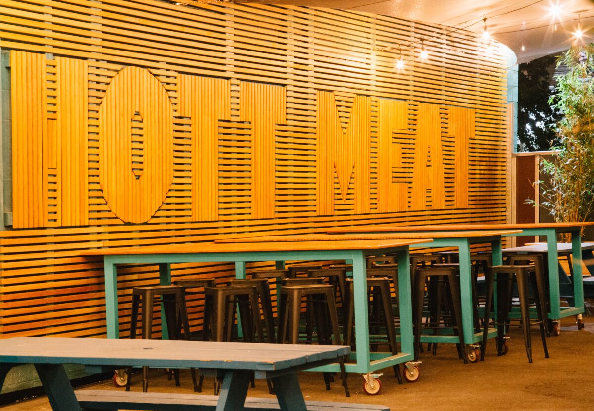 The outdoor dining area at Sideyard BBQ by HottMess.