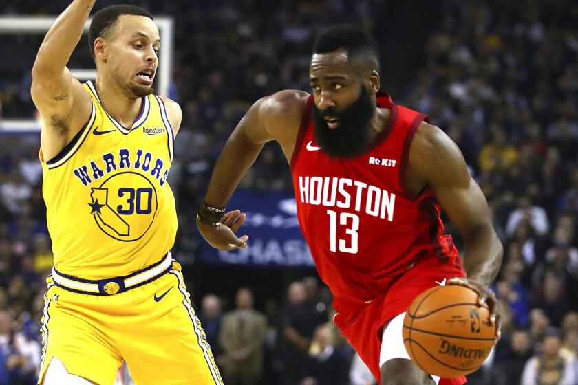 Houston Rockets' James Harden, right, is defended by Golden State Warriors' Stephen Curry (30) during the first half of an NBA basketball game Thursday, Jan. 3, 2019, in Oakland, Calif. (AP Photo/Ben Margot)