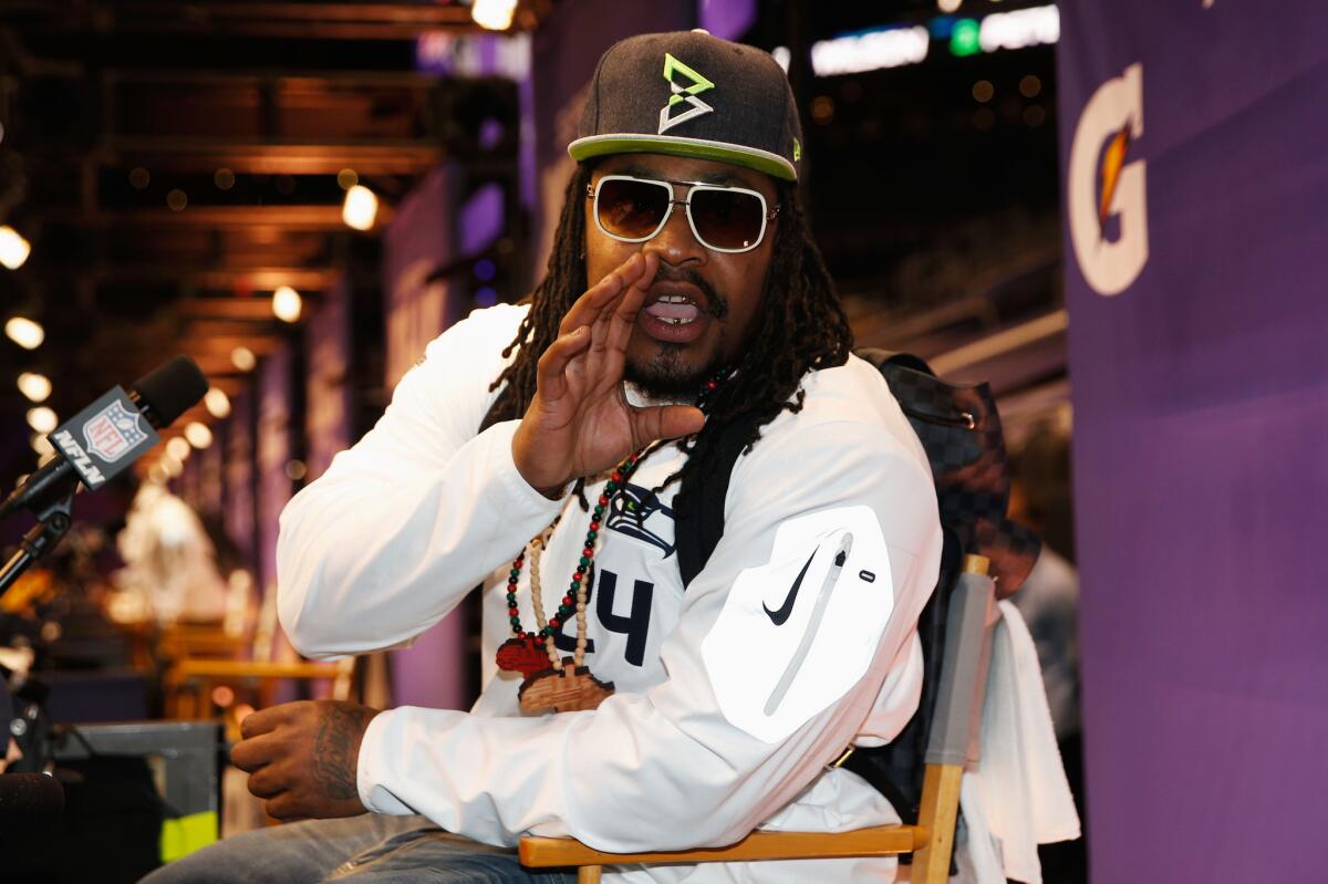 Seattle running back Marshawn Lynch takes part in a media session leading up to Super Bowl XLIX.