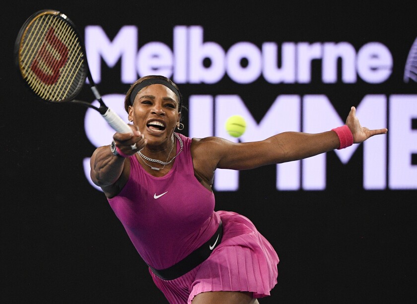 United States' Serena Williams makes a forehand return to compatriot Danielle Collins during a tuneup event ahead of the Australian Open tennis championships in Melbourne, Australia, Friday, Feb. 5, 2021.(AP Photo/Andy Brownbill)