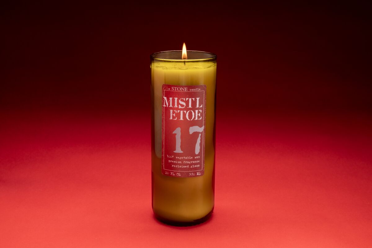 Mistletoe 17 in a reclaimed wine bottle from Stone Candles