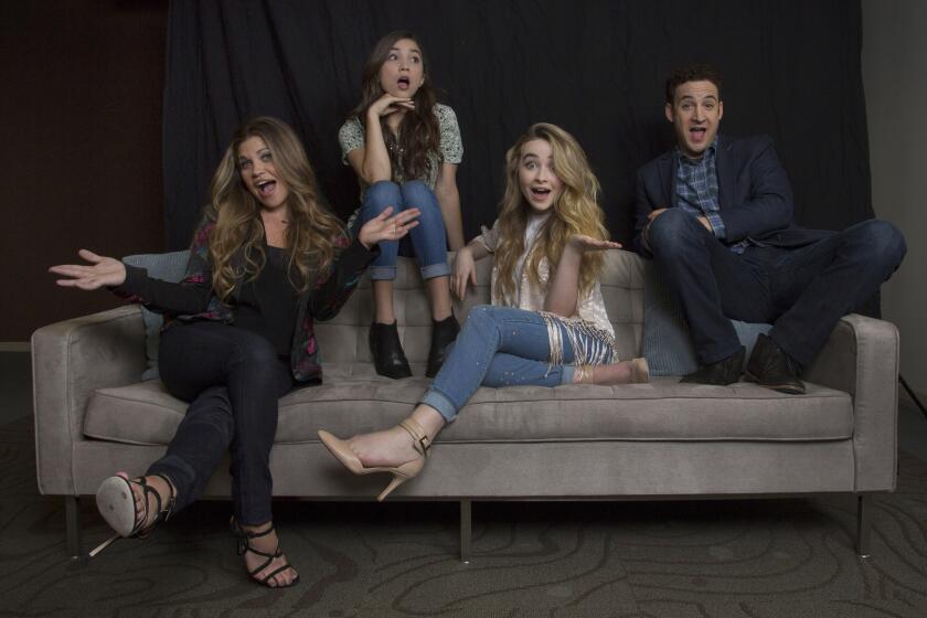 "Girl Meets World" stars Danielle Fishel left, Rowan Blanchard, Sabrina Carpenter and Ben Savage, seen at the Disney Channel offices in Burbank, can look forward to a second season.