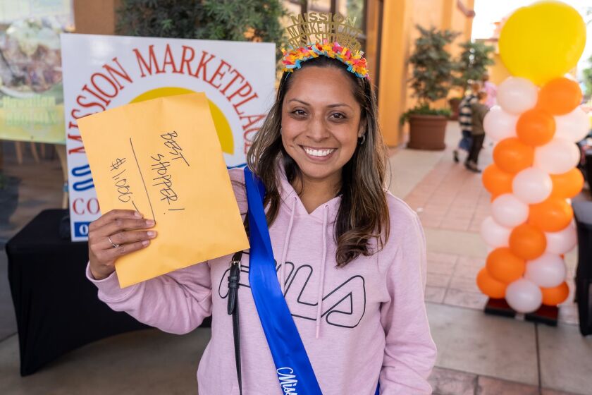 Diana Cruz Ortiz won the Oceanside Best Shopper contest at Mission Marketplace recently, taking home $1,000.