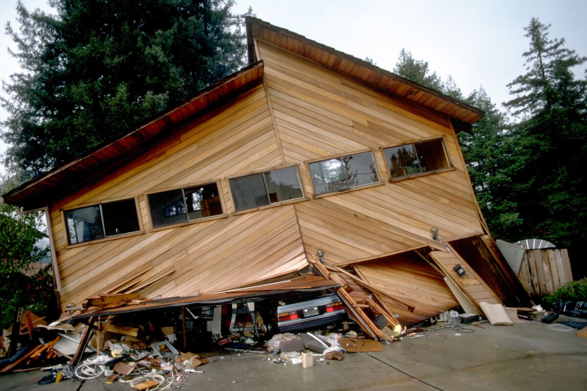 A home collapsed on its garage during the magnitude 6.9 Loma Prieta earthquake of 1989 in the Santa Cruz Mountains.