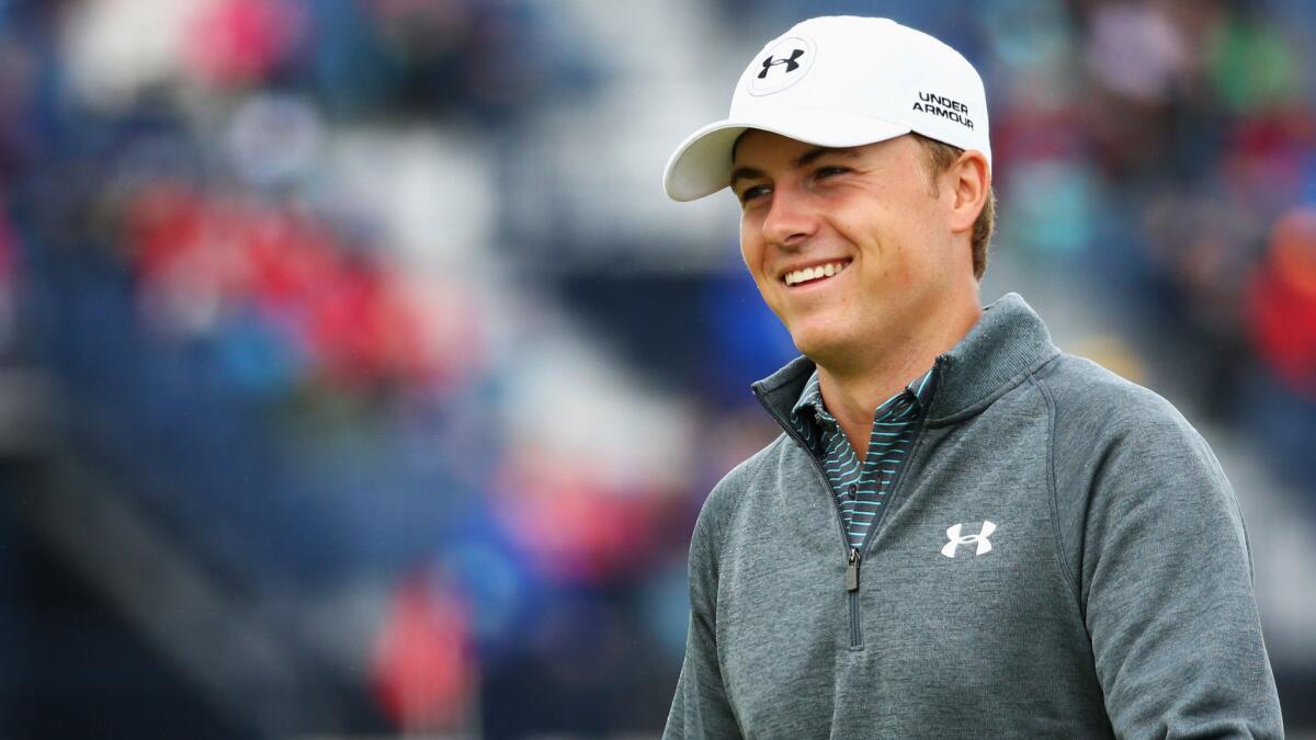 Jordan Spieth smiles during a practice round on The Old Course at St. Andrews on Wednesday.