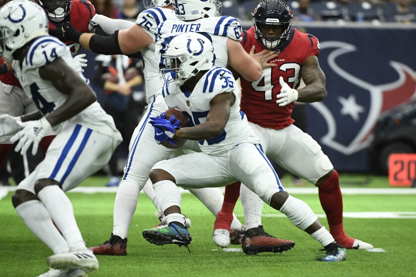 Indianapolis Colts running back Deon Jackson (35) runs against the Houston Texans during the second half of an NFL football game, Sunday, Dec. 5, 2021, in Houston. (AP Photo/Justin Rex )