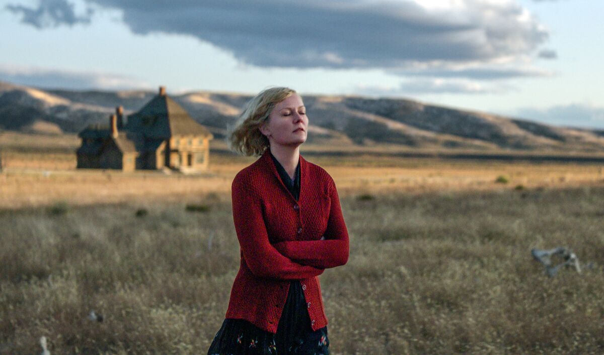 This image released by Netflix shows Kirsten Dunst in a scene from "The Power of the Dog" (Netflix via AP)