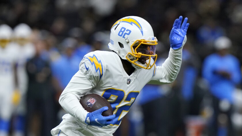 Chargers wide receiver DeAndre Carter runs after making a catch against the New Orleans Saints on Friday.