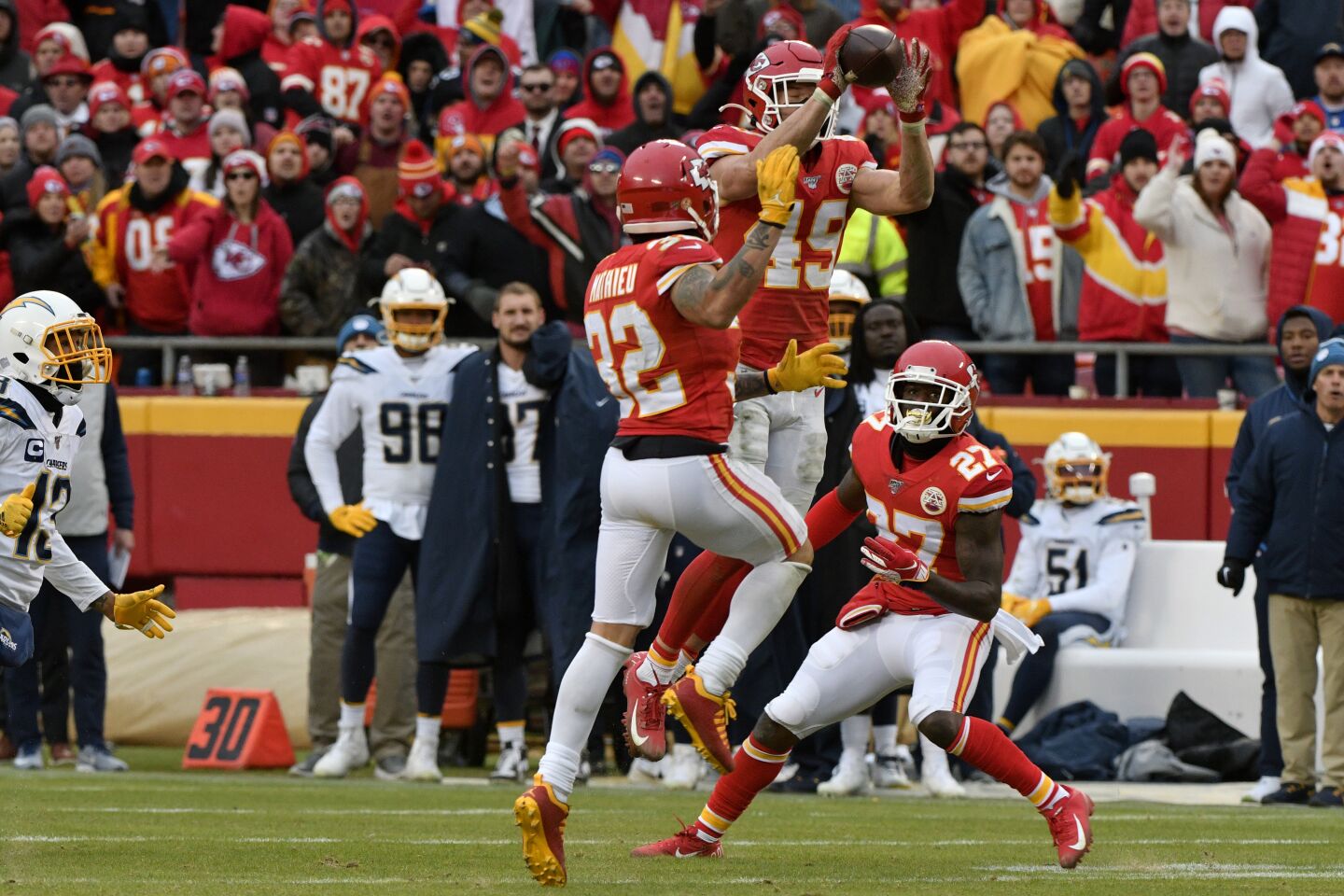 Chiefs safety Daniel Sorensen (49) intercepts a pass intended for Chargers receiver Keenan Allen during a game Sunday.