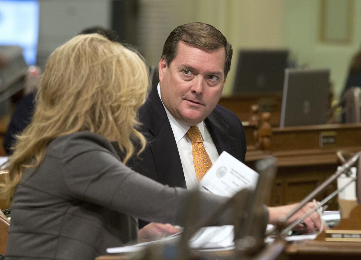 Assemblyman William Brough (R-Dana Point), right, talks with Marie Waldron (R-Escondido), in Sacramento in 2016.