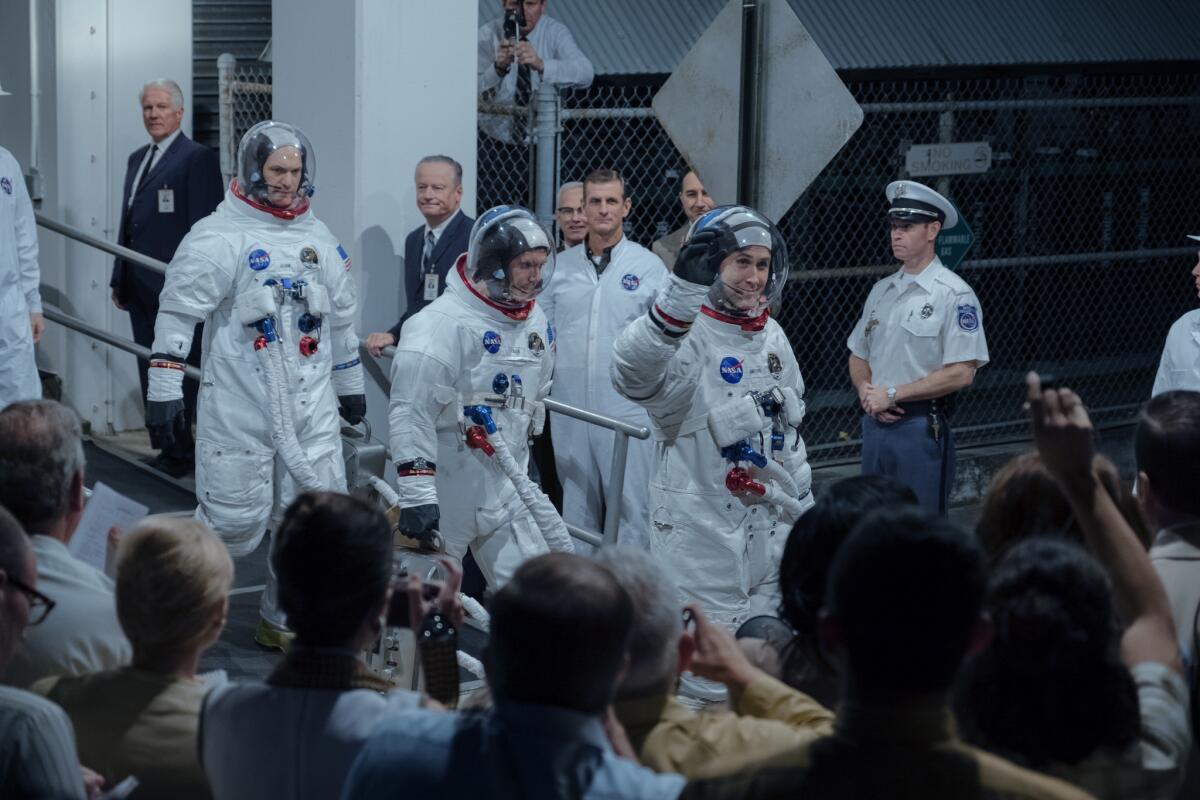 Ryan Gosling (waving) as Neil Armstrong in Oscar-winning director Damien Chazelle's upcoming film "First Man."
